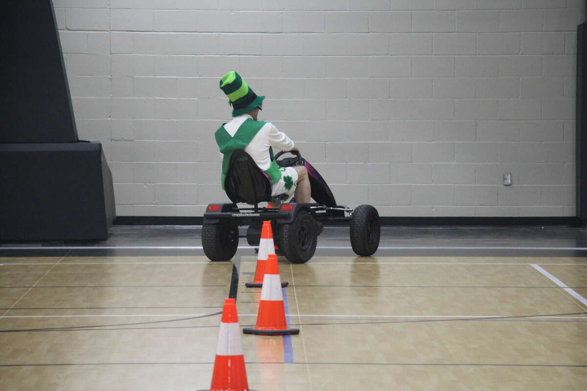 Raymond Bugg, of the Bugg's, tested out the MSP's Fatal Vision Pedal Cars with goggles on.