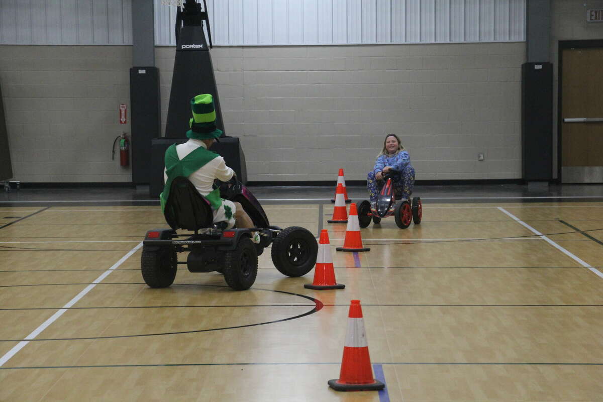 Raymond Bugg, of the Bugg's, tested out the MSP's Fatal Vision Pedal Cars with goggles on.