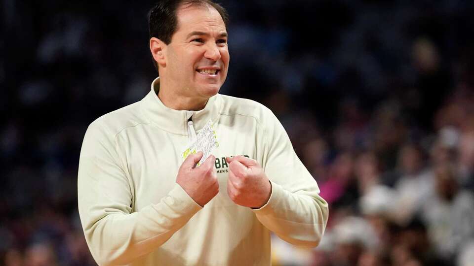 Baylor head coach Scott Drew reacts on the sideline in the first half of a second-round game against North Carolina in the NCAA college basketball tournament in Fort Worth, Texas, Saturday, March, 19, 2022. (AP Photo/Tony Gutierrez)