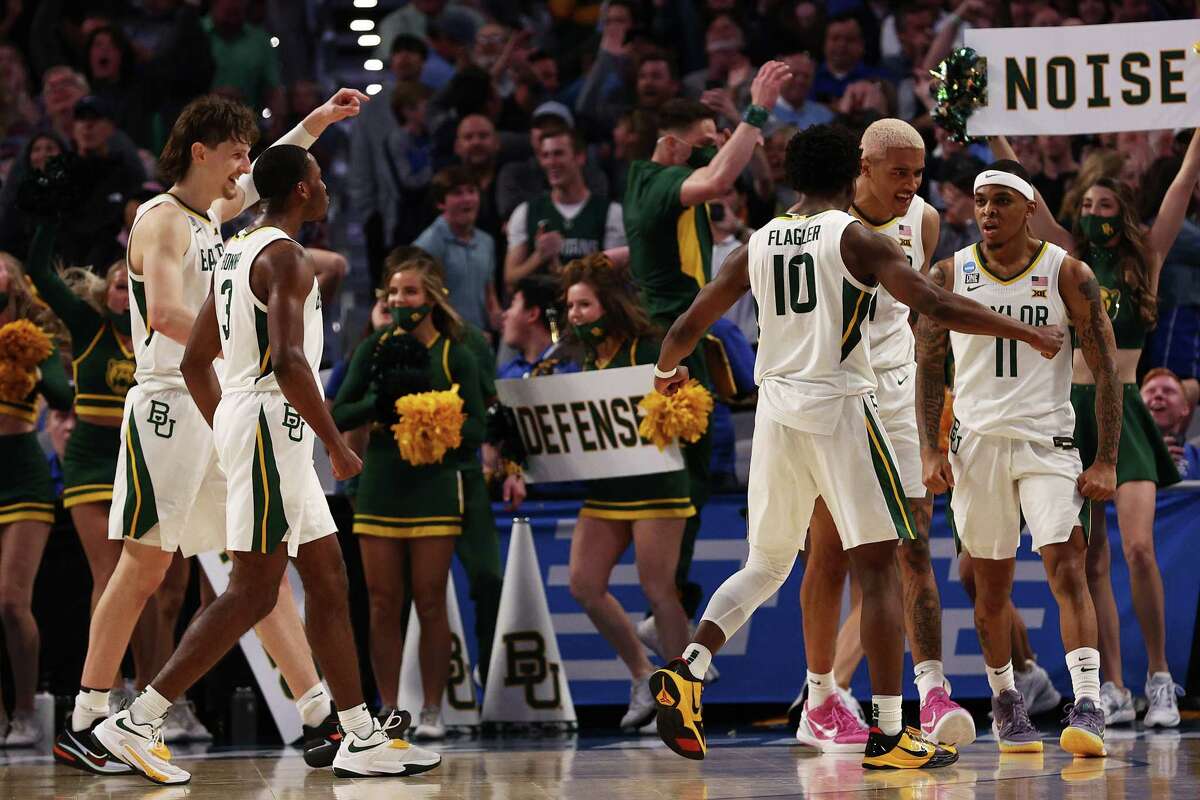 Baylor celebrates after tying the score during the final seconds of the second half but the Bears' good fortune ran out in overtime as their national title defense ended with a second-round loss to North Carolina on Saturday in Fort Worth.