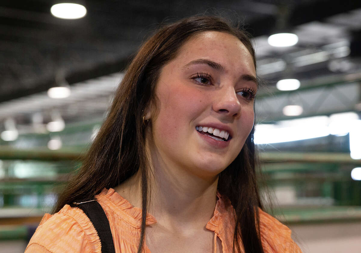 The Junior Market Steer Grand Champion Aven Horn, 16, of Anson, tears up when she talks about her steer, Vanilla Ice, after he was sold at the auction at Houston Livestock Show and Rodeo Saturday, March 19, 2022, at NRG Arena Sales Pavillion in Houston. Vanilla Ice was sold at record-breaking $1M.