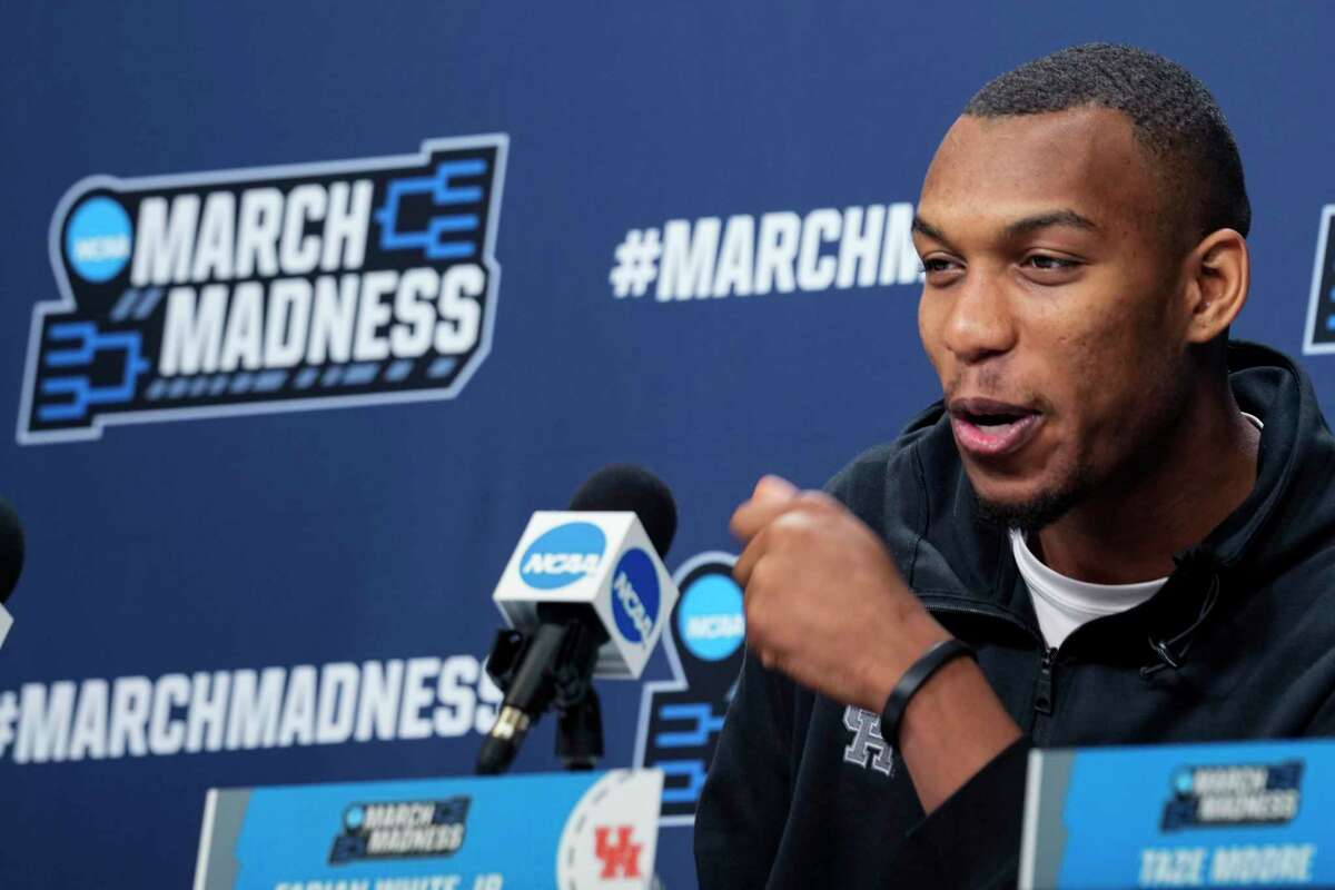 Houston forward Fabian White Jr., answers questions during a news conference leading into the second round in the NCAA men's college basketball tournament Saturday, March 19, 2022, in Pittsburgh. The Cougars play Illinois in the second round of the tournament.