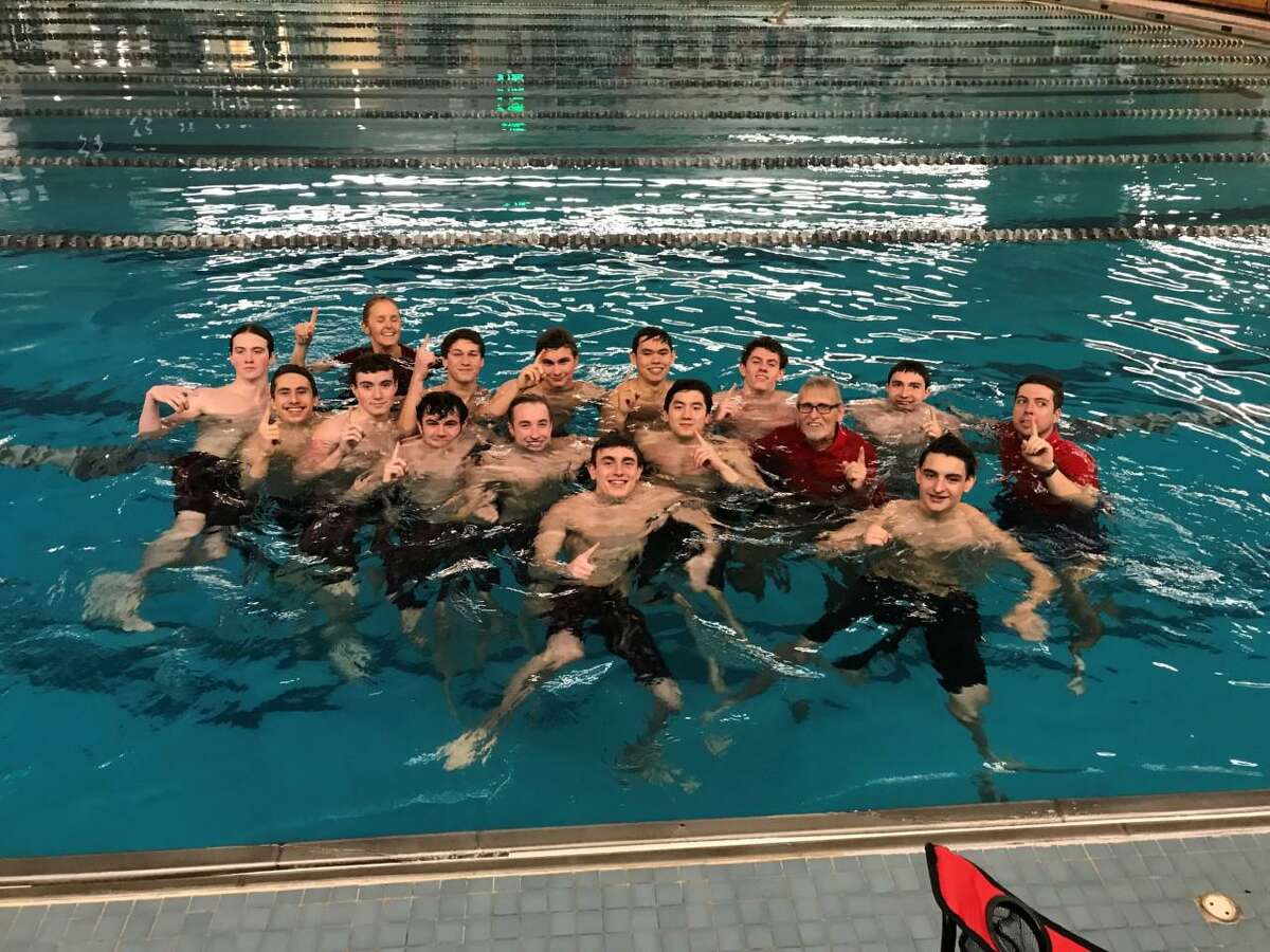 Greenwich celebrates in the pool after winning the State Open boys title on Saturday.