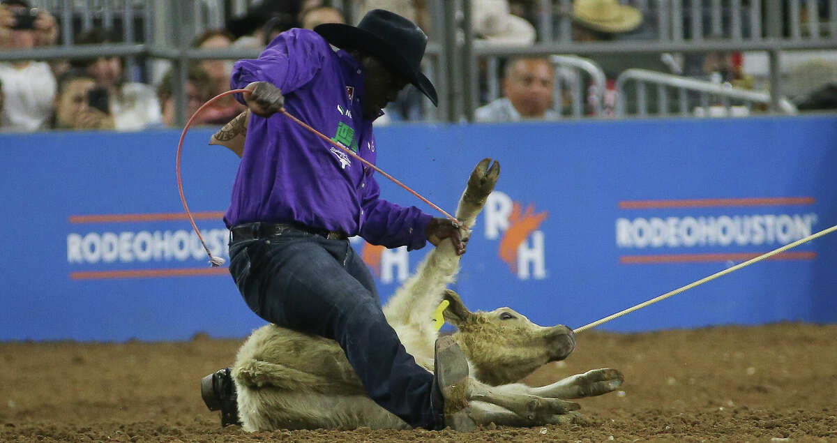 John Douch wins tie-down roping in Super Series Championship Round with 7.7 seconds at Houston Livestock Show and Rodeo Saturday, March 19, 2022, at NRG Stadium in Houston.