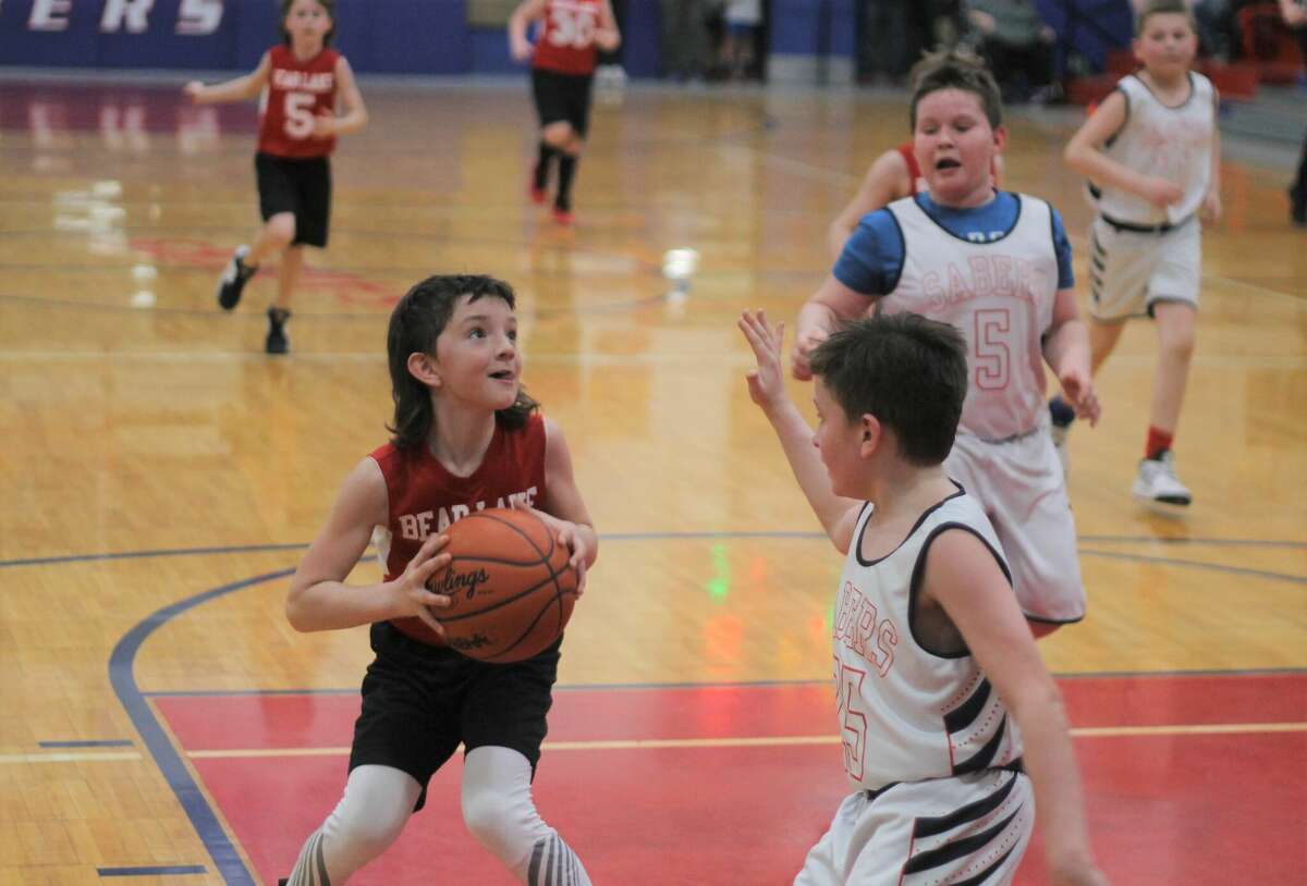 Bear Lake's Colin Farfsing looks to score Saturday during the David Masengarb Memorial Elementary Boys Basketball Tournament  at Manistee Catholic Central.