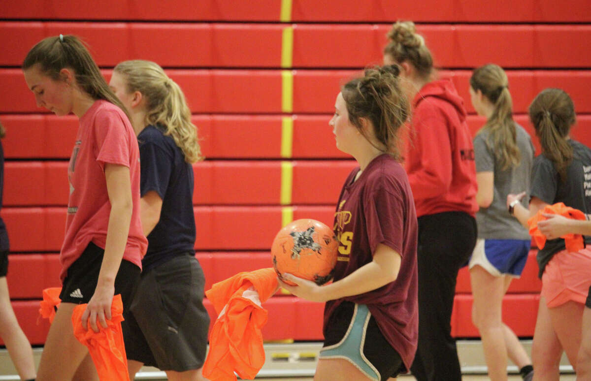 Reed City girls soccer players get set to finish up a practice on Friday.