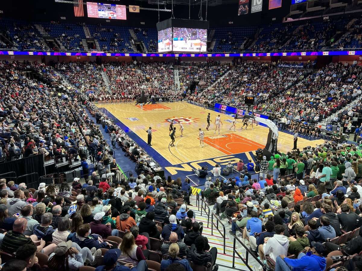 The Mohegan Sun Arena filled up during a CIAC basketball championship game