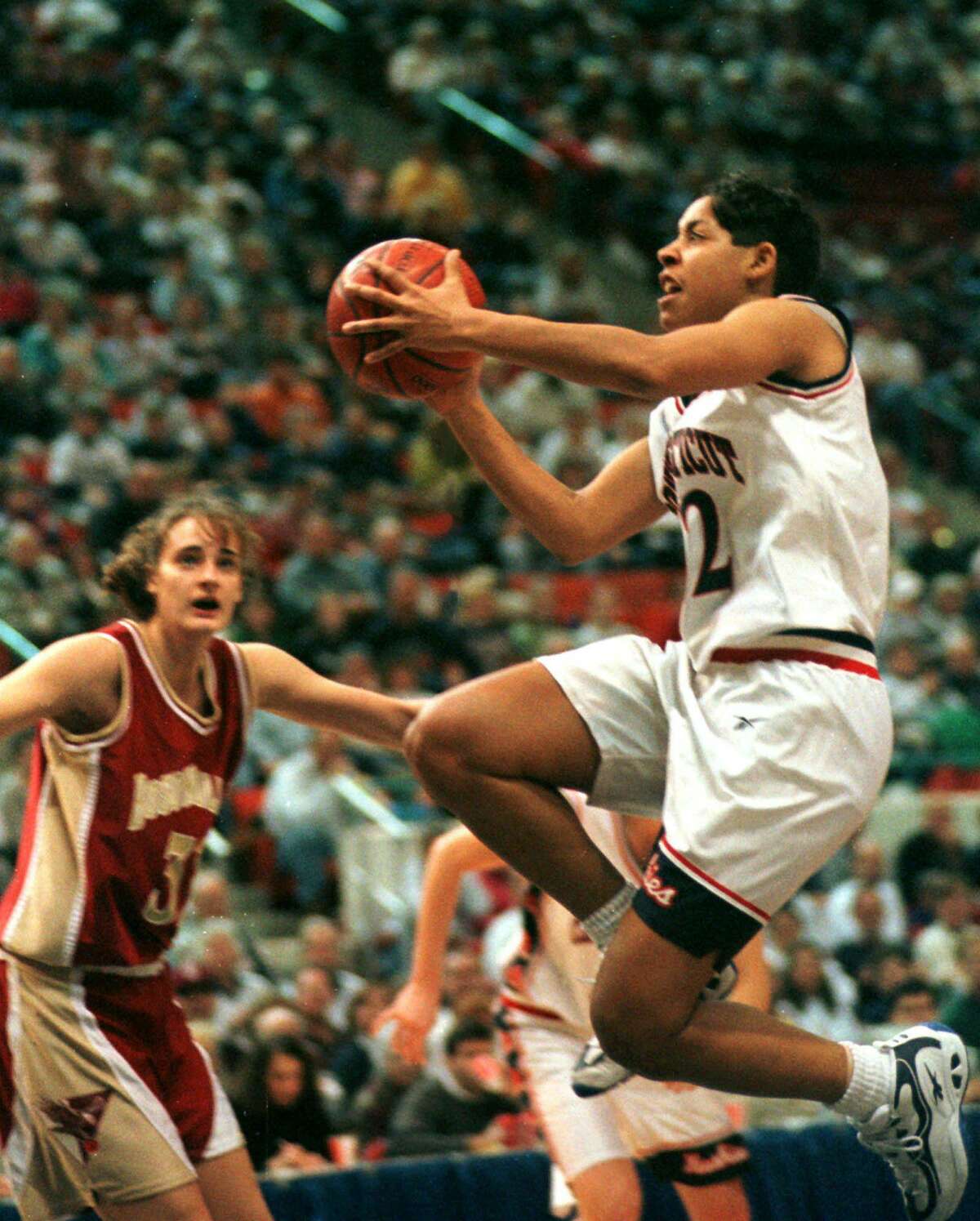 UConn’s Nykesha Sales goes up in for a shot against Boston College in 1998 in Hartford.