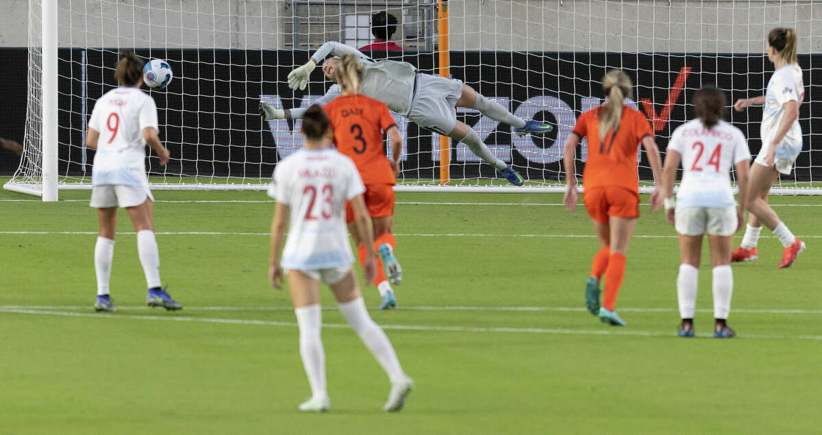 Chicago Red Stars defender Arin Wright (3) scores on a penalty kick against Houston Dash goal keeper Jane Campbell (1) in the second half at PNC Stadium on March 20, 2022 in Houston. Chicago won 3 to 1.