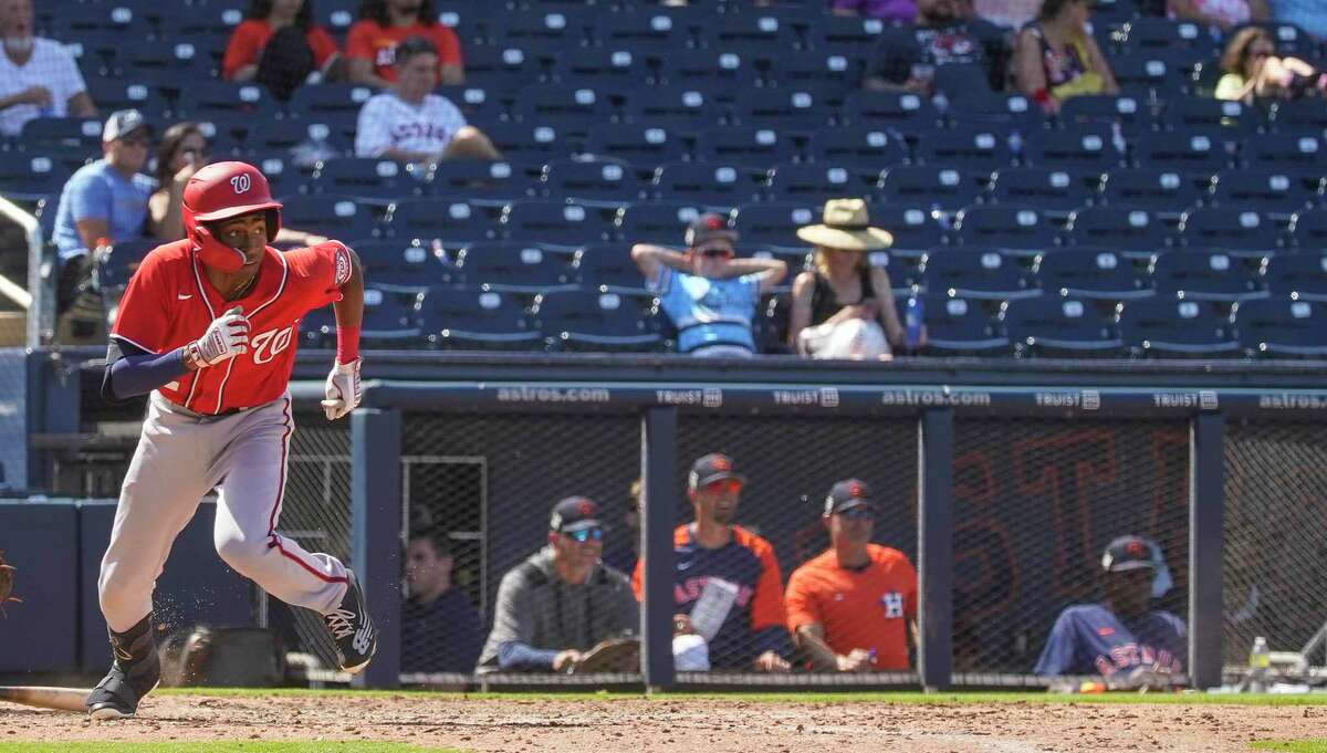 Washington Nationals Darren Baker (2) runs up the line after hitting a single off of Houston Astros Chad Donato in the seventh inning during a MLB spring training game at The Ballpark of the Palm Beaches on Sunday, March 20, 2022 in West Palm Beach.