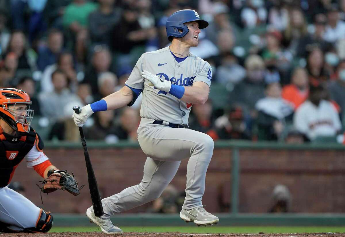 SAN FRANCISCO, CALIFORNIA - JULY 27: Billy McKinney #29 of the Los Angeles Dodgers hits an RBI single scoring Cody Bellinger #35 against the San Francisco Giants in the top of the fifth inning at Oracle Park on July 27, 2021 in San Francisco, California. (Photo by Thearon W. Henderson/Getty Images)