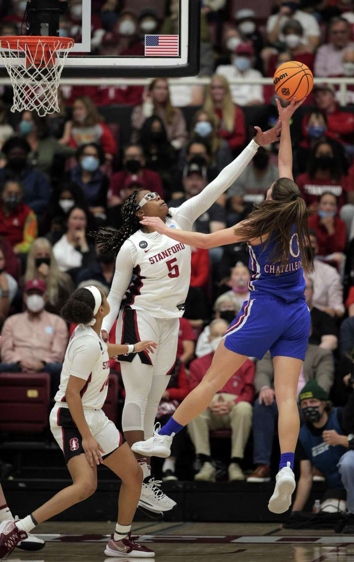 Francesca Belibi (5) tries to defend against Ioanna Chatzileonti (10) In the first half as the Stanford Cardinal played the Kansas Jayhawks at Maples Pavilion in round 2 of the NCAA Womens’ Tournament in Stanford, Calif., on Sunday, March 20, 2022.