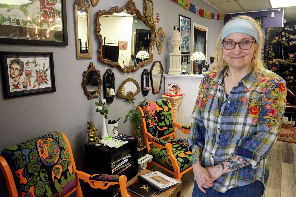 Carolyn Hawkins, owner of Shelton Tattoo Shop in Shelton, Conn. March 14, 2022.