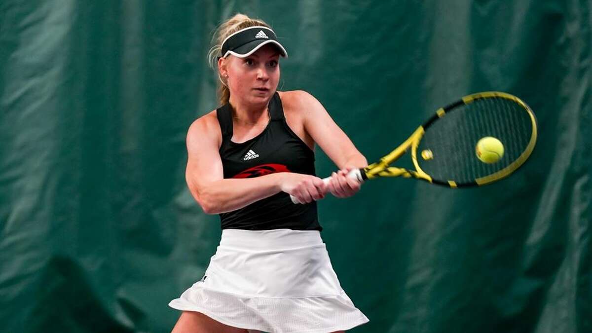 SIUE's Amber Hochstatter connects for a shot during her singles match against Milwaukee on Sunday in Edwardsville.