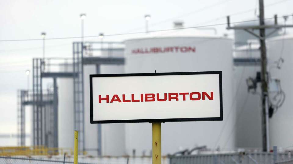 Signage is displayed outside a Halliburton Co. location in Port Fourchon, Louisiana, U.S., on Thursday, Feb. 8, 2018. U.S. oil explorers added rigs this week as crude prices recovered from their worst weekly decline in two years. Photographer: Luke Sharrett/Bloomberg