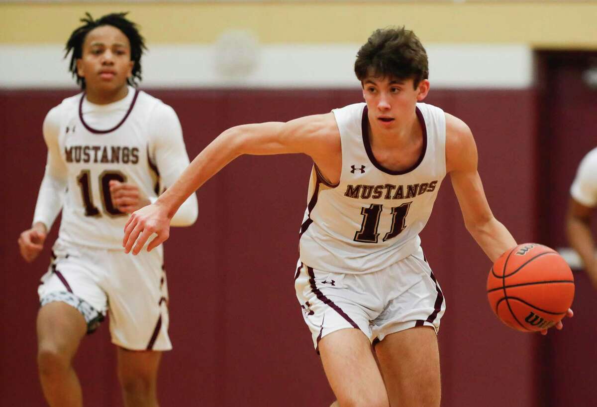 Magnolia West guard Brandon Beavers (11) looks down court in the first quarter of a high school basketball game at Magnolia West High School, Friday, Feb. 4, 2022, in Magnolia.