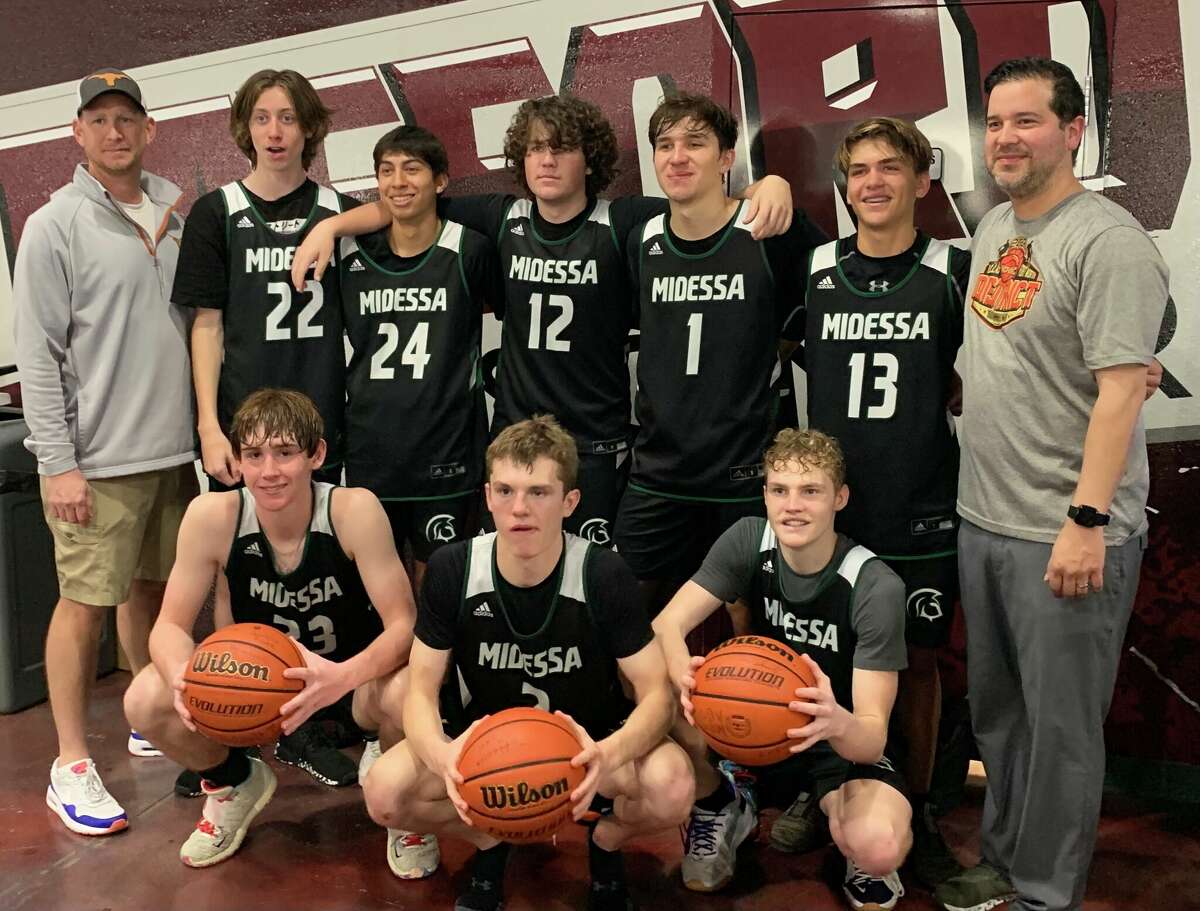The Midessa Warriors pose after concluding the National Christian Home School Basketball Tournament on Friday. First Row holding game balls are seniors Wesley Sherrill (23) Steven Cooley (2) and Jefferson Pond (5). Back row is coach Jay Sherrill, Kohl Bremerman (22) Nate Rawls (24) Caden Edwards (12) Matt Castillo (1) Cole Rawls (13) coach Damien Castillo.
