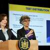 Gov. Kathy Hochul, left, is joined by Health Commissioner Dr. Marry T. Bassett, right, for an update on the state's progress combating COVID-19 on Monday, March 21, 2022, during a press conference at the David Axelrod Institute in Albany, N.Y.