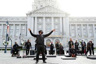 Joel Yates performs in the SkyWatchers’ “From Containment to Expansion" at San Francisco’s Civic Center.