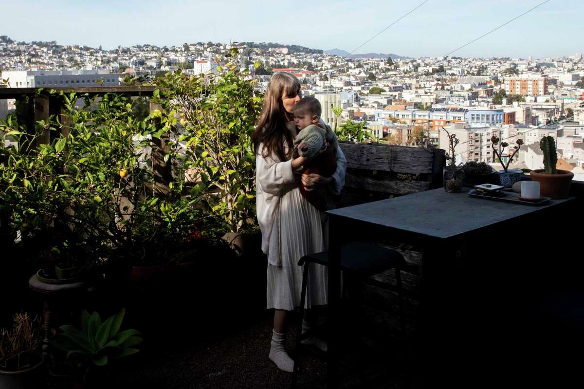 Heather D’Angelo, who was vaccinated against the coronavirus while pregnant, holds her son Jules outside her San Francisco home. New research shows that unvaccinated pregnant women infected with the virus had a higher risk of serious conditions like blood clots.