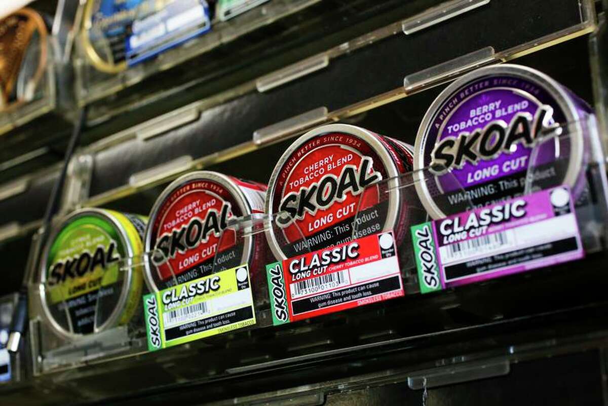 Flavored tobacco is seen on the shelves at City Smoke and Vape Shop in San Francisco on June 11, 2017. The city’s voters banned sales of flavored tobacco products by passing Proposition E in 2018.