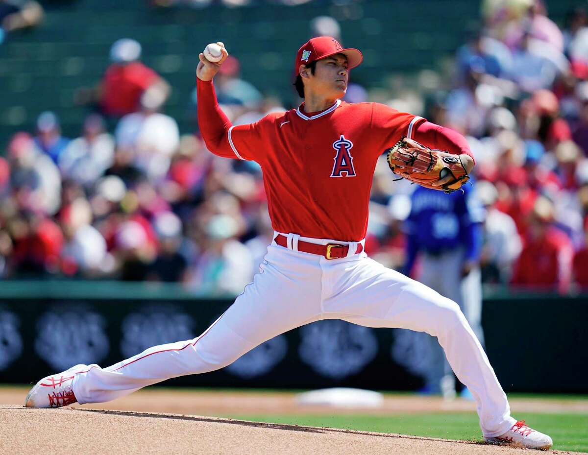 American League MVP Shohei Ohtani throws against the Royals it his first spring training outing. Ohtani retired seven of the 11 batters he faced, stricking out five.