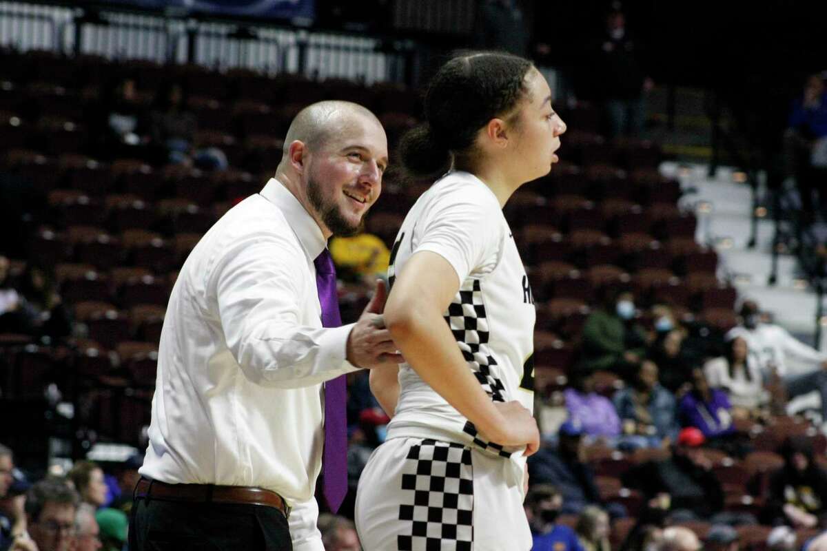 East Hartford coach Jonathan Myette encourages a player in the first half. East Hartford defeated Wilton 54-33 in the CIAC 2022 State Girls Basketball Tournament Class LL Finals at the Mohegan Sun Arena on March 20, 2022 in Uncasville, Connecticut.