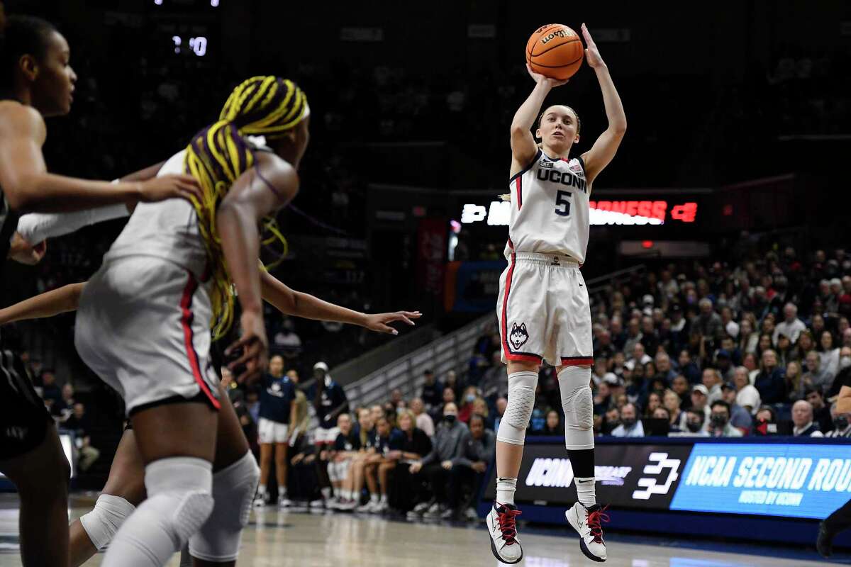 UConn’s Paige Bueckers (5) shoots against UCF during Monday’s second-round NCAA Tournament game.