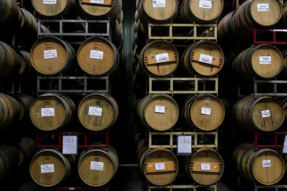 Barrels of wine in the cellar of Bending Branch Winery in Comfort.