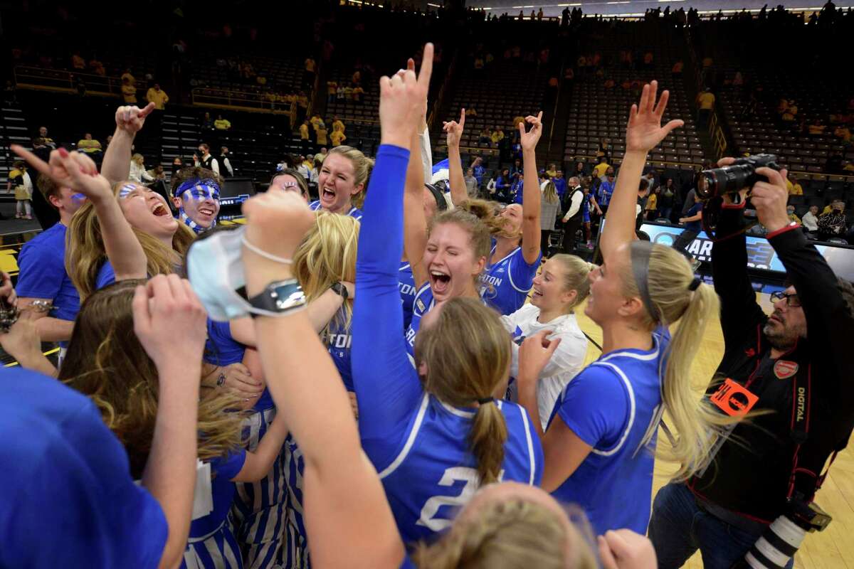 Creighton players celebrate their team's 64-62 over Iowa during a second-round game in the NCAA women's college basketball tournament, Sunday, March 20, 2022, in Iowa City, Iowa.
