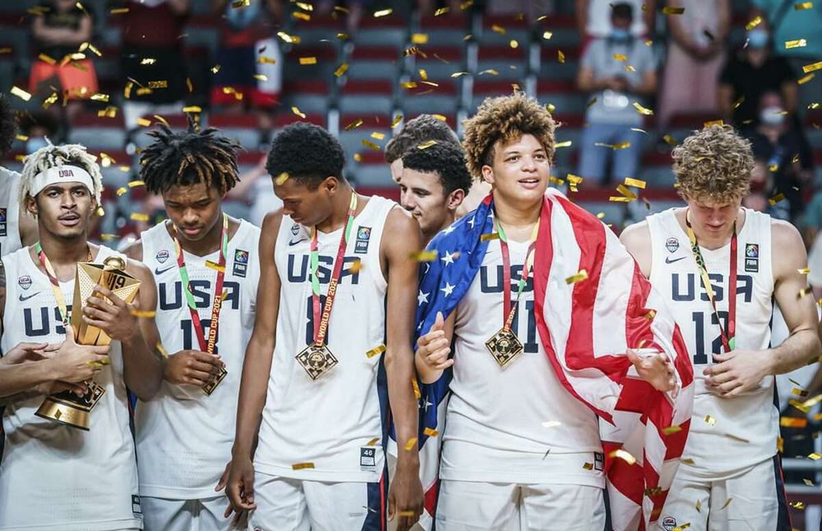 Port Arthur's Kenneth Lofton Jr. celebrates with his USA teammates after winning gold on Sunday at the U-19 FIBA World Cup in Riga, Latvia.