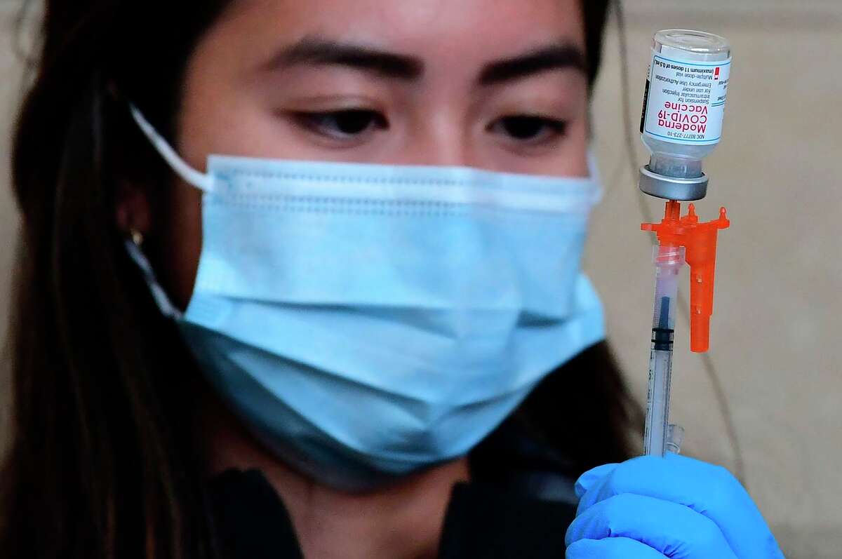 A dose of Moderna’s COVID-19 vaccine is prepared for administration at Union Station in Los Angeles on Jan. 7.