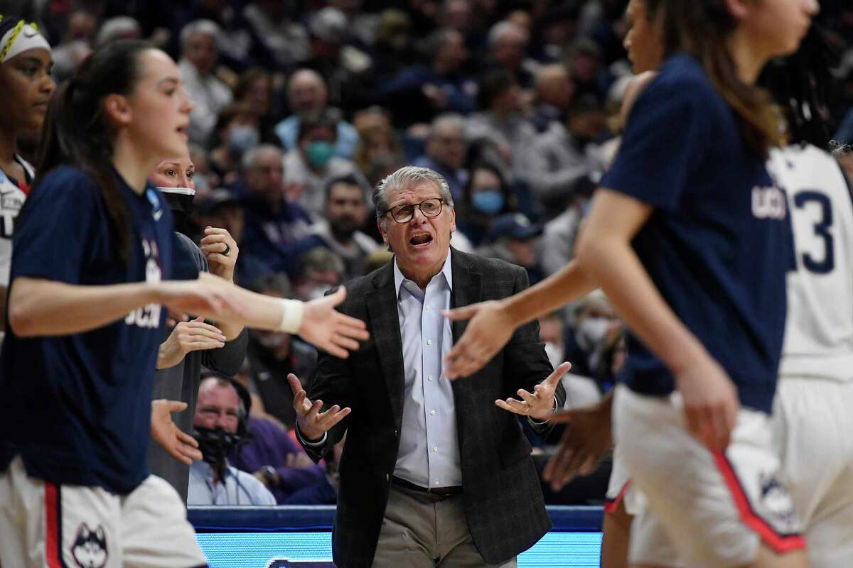 Connecticut head coach Geno Auriemma calls out to a player during the second half of a second-round women's college basketball game in the NCAA tournament, Monday, March 21, 2022, in Storrs, Conn. (AP Photo/Jessica Hill)