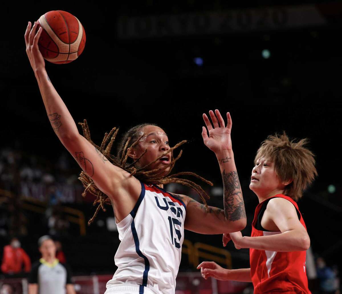 The United States' Brittney Griner (15) shoots over Japan's Maki Takada (8) during the Tokyo 2020 Olympics Women's Basketball Final at Saitama Super Arena on Aug. 8, 2021, in Saitama, Japan. (Robert Gauthier/Los Angeles Times/TNS)