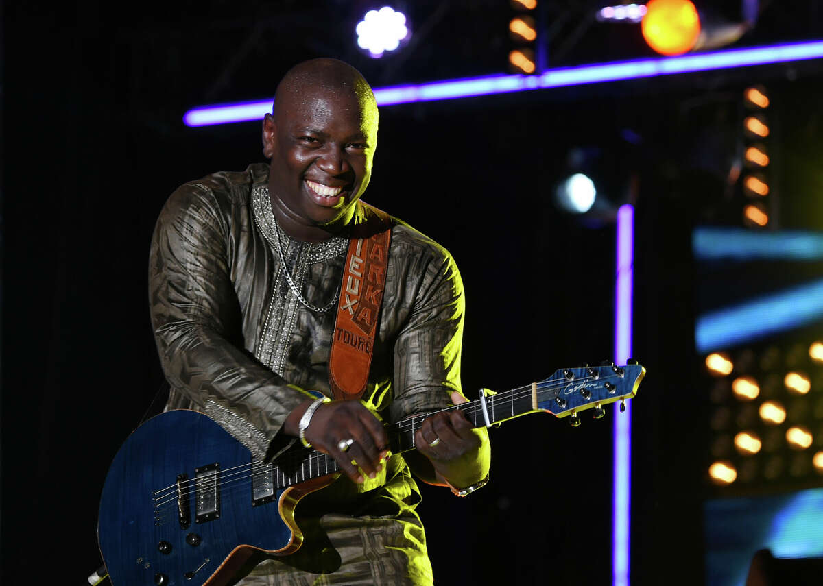Malian singer and musician Vieux Farka Toure performs on April 22, 2016 in Abidjan, during the 9th edition of the Festival of Urban Music of Anoumabo (FEMUA). / AFP / SIA KAMBOU (Photo credit should read SIA KAMBOU/AFP via Getty Images)