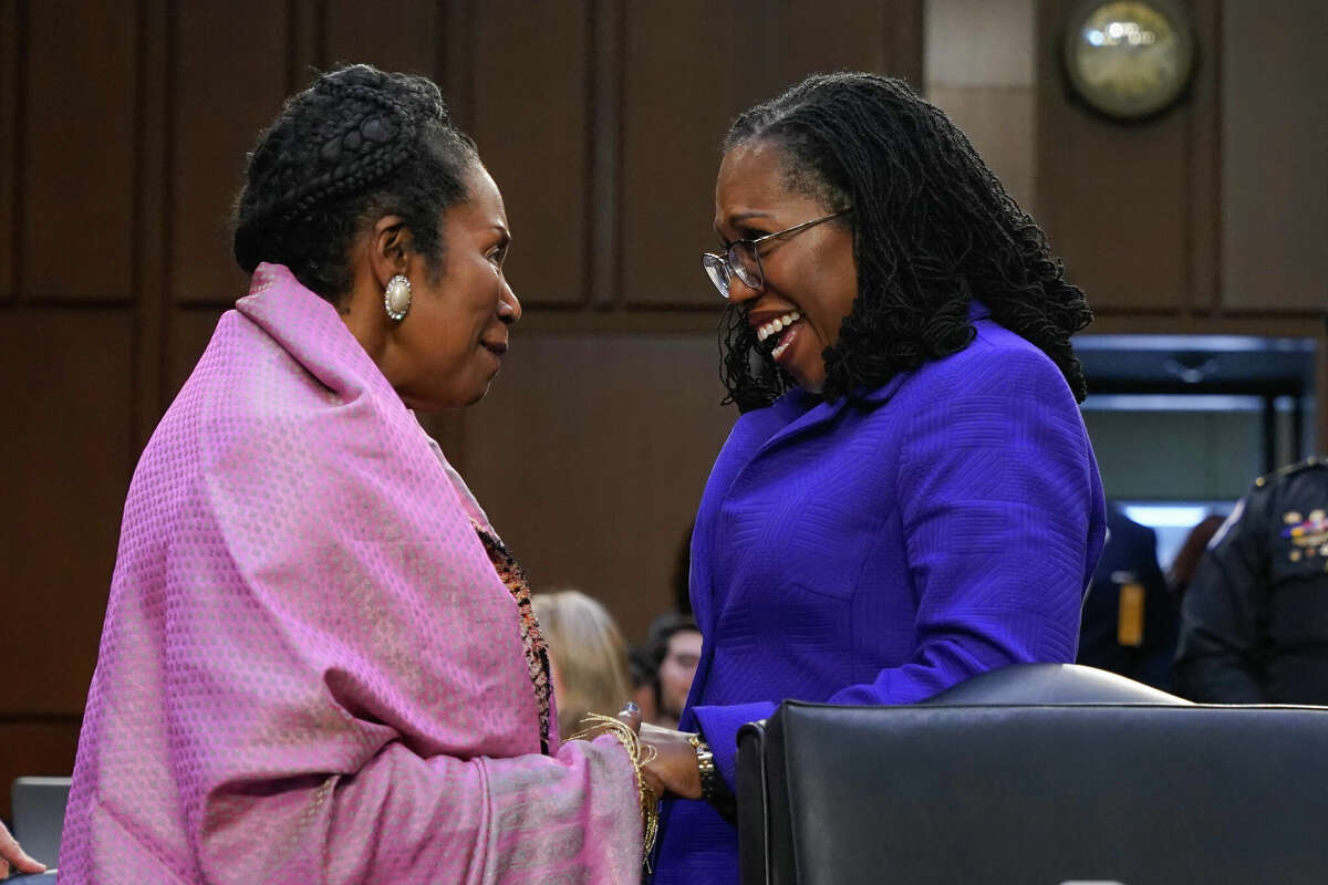 Rep. Sheila Jackson Lee, D-Texas, greets Supreme Court nominee Judge Ketanji Brown Jackson during a break in her confirmation hearing before the Senate Judiciary Committee Monday, March 21, 2022, on Capitol Hill in Washington. (AP Photo/Jacquelyn Martin)