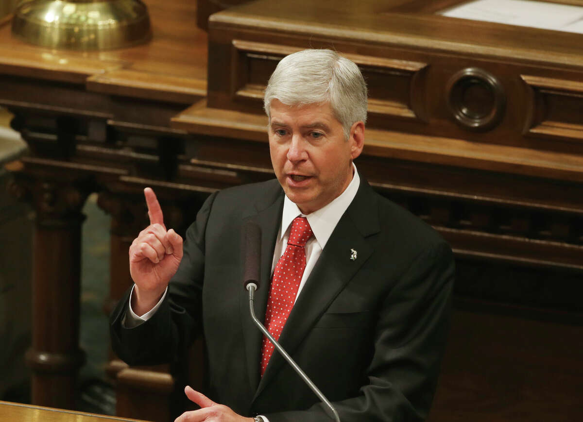 Michigan Gov. Rick Snyder delivers his third annual State of the State address to a joint session of the state Legislature in the Capitol, Wednesday, Jan. 16, 2013. Generating new money for Michigan's transportation network was the centerpiece of Snyder's address. (AP Photo/Carlos Osorio)