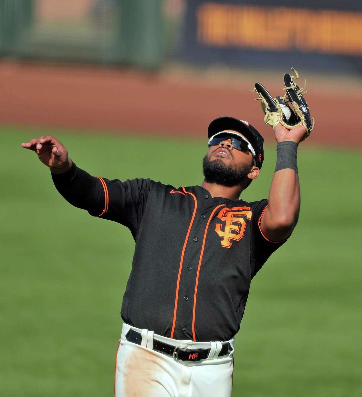 Heliot Ramos (80) makes a catch in the sixth inning as the San Francisco Giants played the Chicago White Sox in a spring training game at Scottsdale Stadium in Scottsdale, Ariz., on Thursday, March 4, 2021.