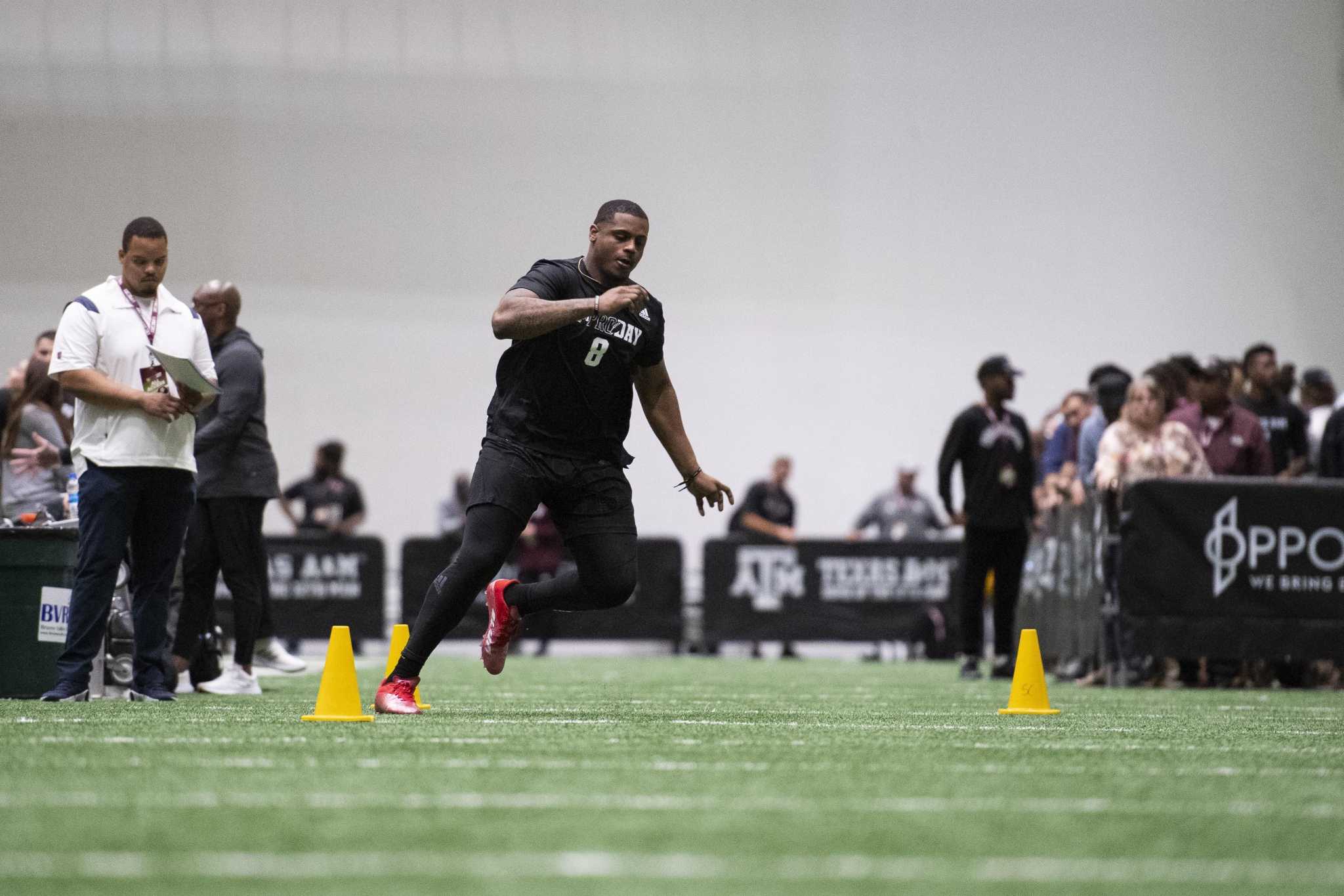 Texas A&M running back Isaiah Spiller runs a drill during the NFL