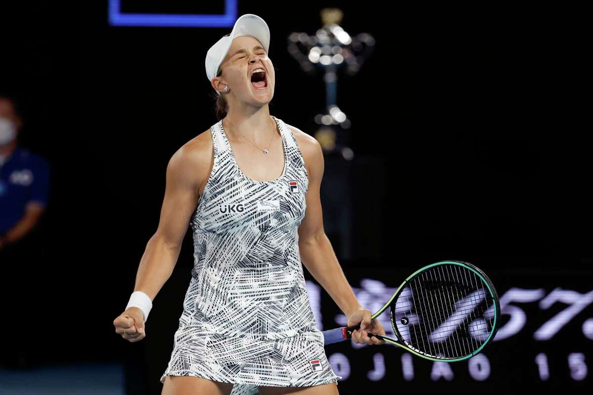 FILE - Ash Barty of Australia celebrates after defeating Danielle Collins of the U.S., in the women's singles final at the Australian Open tennis championships in Melbourne, Australia on Jan. 29, 2022. In shock announcement Wednesday. March 23, 2022, No. 1-ranked Barty announced her retirement from tennis.