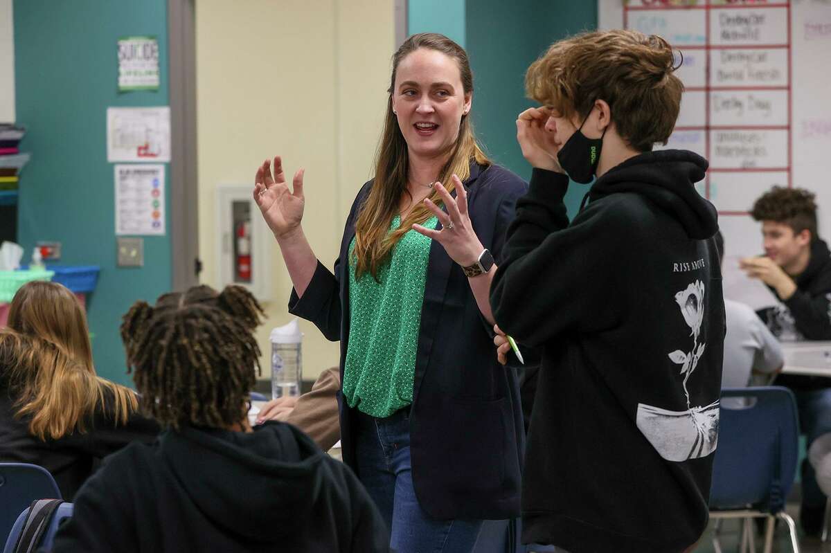 Steele High school chemistry teacher Kendall Hoes, shown with students in an honors chemistry class, is a 2010 Steele graduate in her fifth year of teaching chemistry and engineering at her alma mater. Hoes is being recognized for her innovation, devotion and inspiration in the classroom as she was one of eight San Antonio area educators named as finalists in the 2022 H-E-B Excellence In Education Award competition.