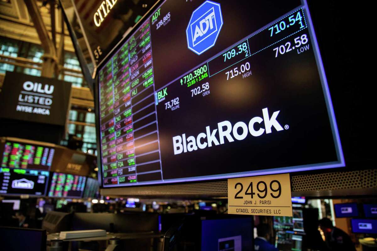 A monitor with Blackrock Inc. signage on the floor of the New York Stock Exchange (NYSE) in New York, U.S., on Tuesday, March 15, 2022.