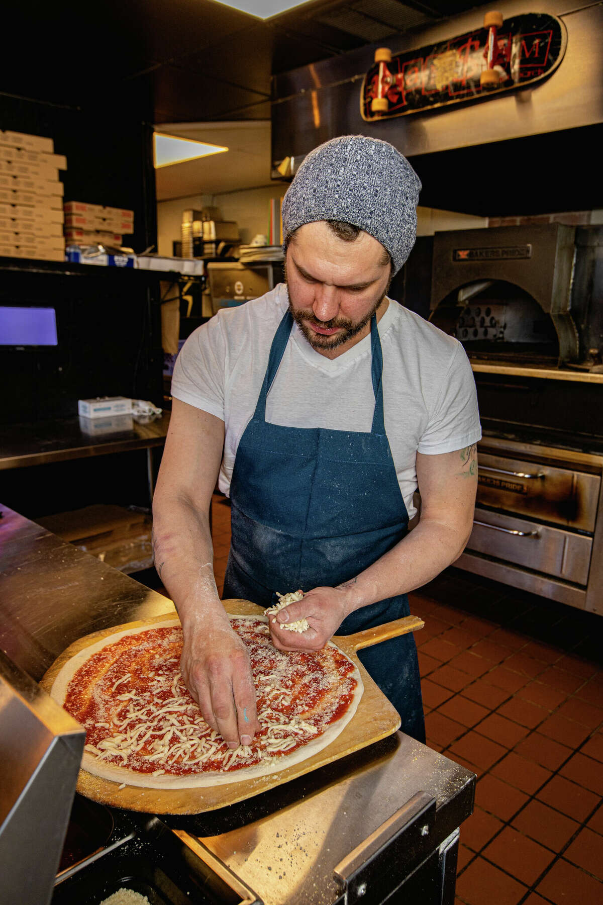 Dante Cistulli making a Bella Roni at Zephyr's Street Pizza in West Hartford.