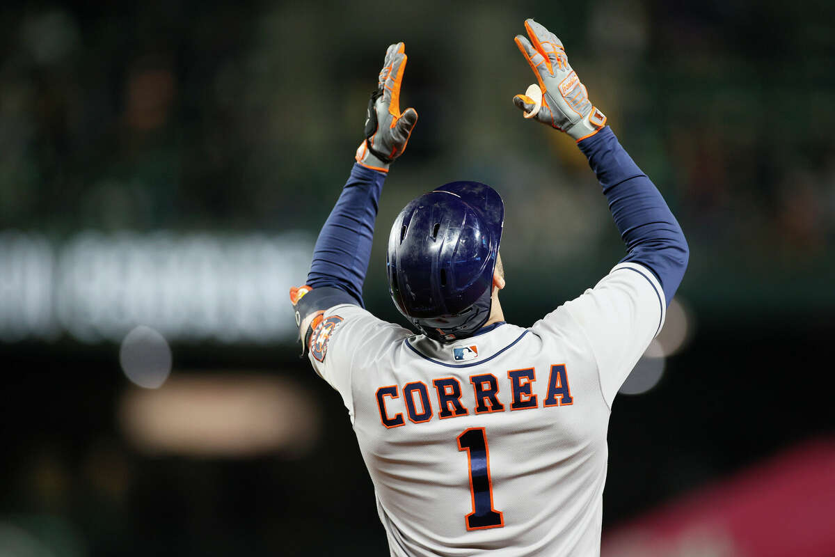 Carlos Correa #1 of the Houston Astros reacts after his single against the Seattle Mariners during the fifth inning at T-Mobile Park on August 30, 2021 in Seattle, Washington.