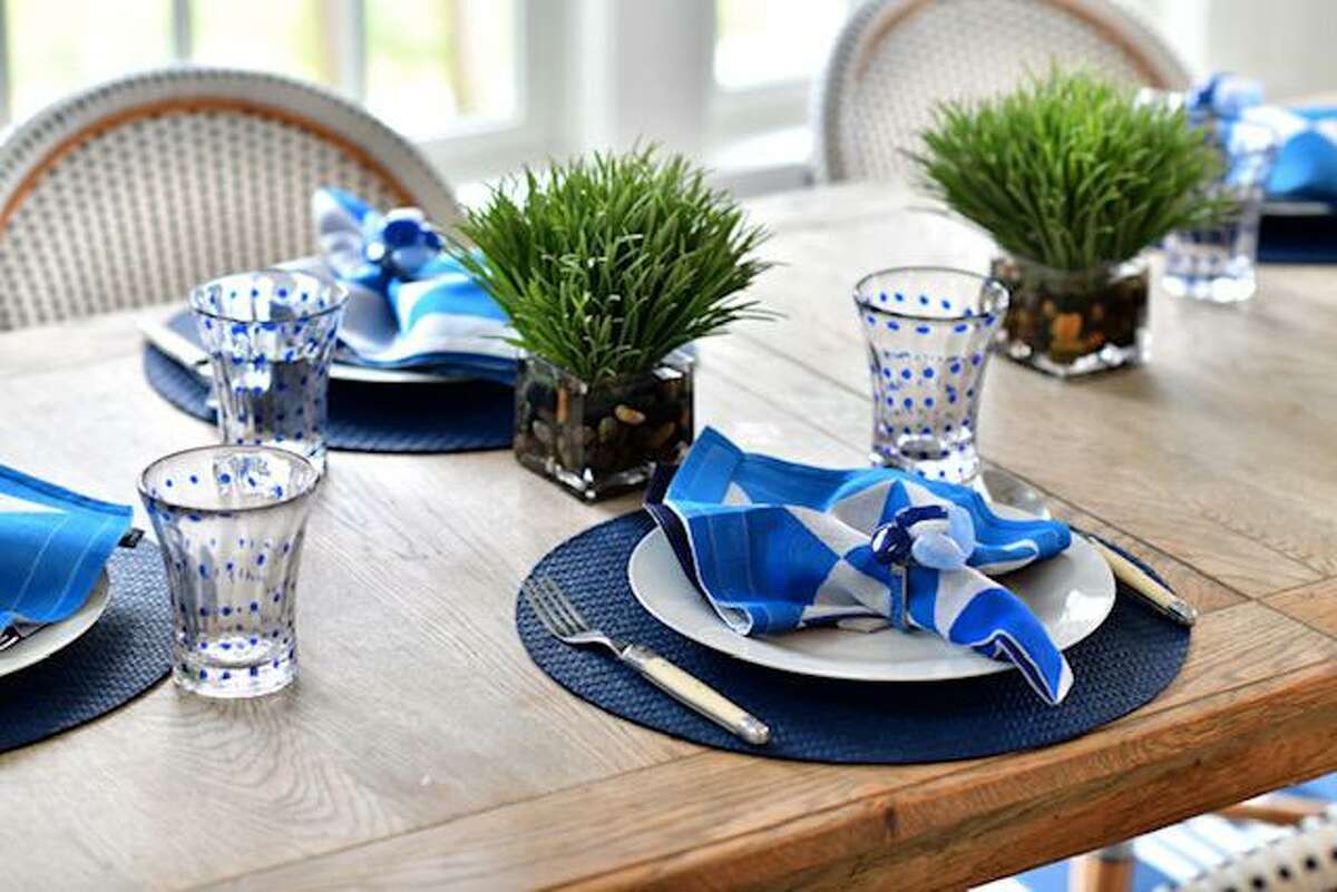 Small changes, like changing to your summer linens and table settings, can change your perspective and lift your spirits.