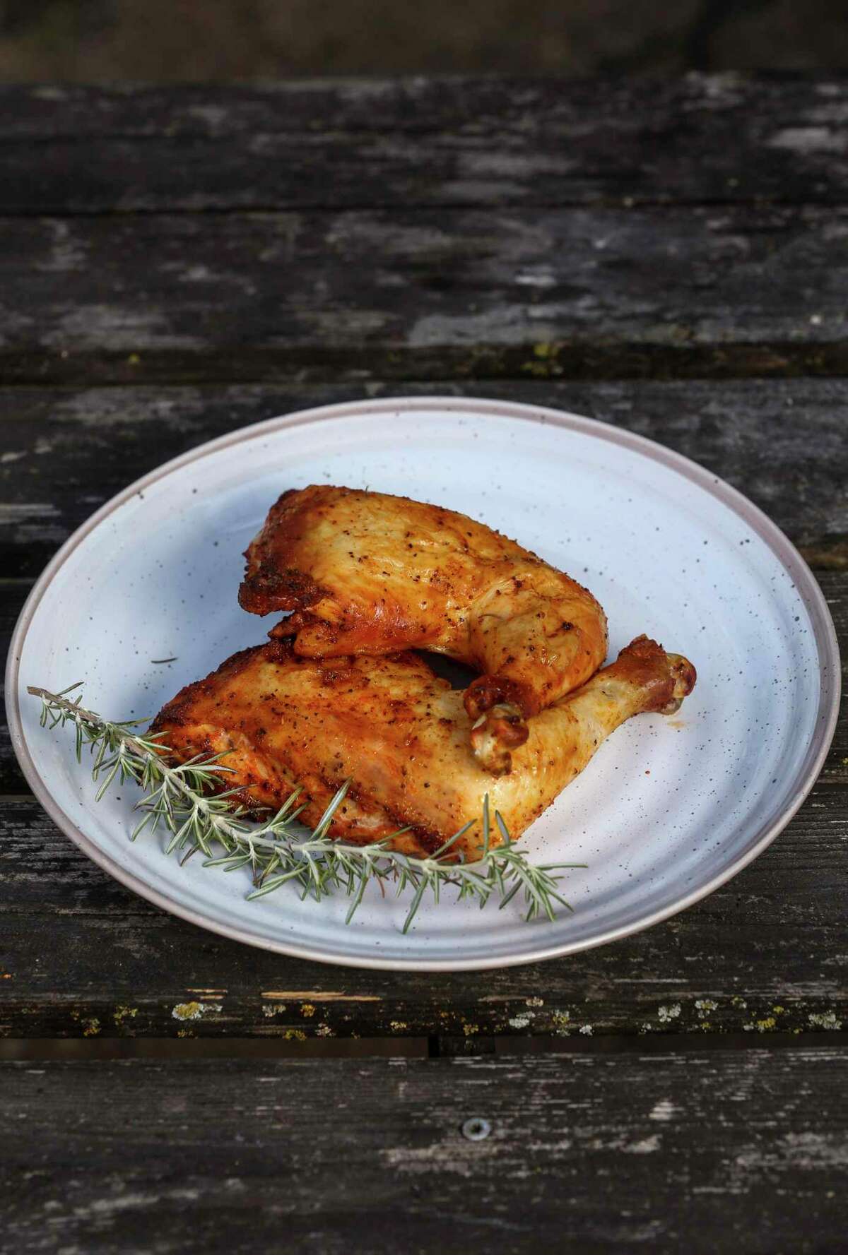 Oven-roasted chicken quarters with crispy skin
