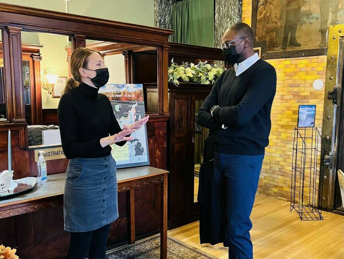 Lindsey Swidorski, pictured here with Lt. Gov. Garlin Gilchrist, was named business leader of the year by the Manistee Area Chamber of Commerce.