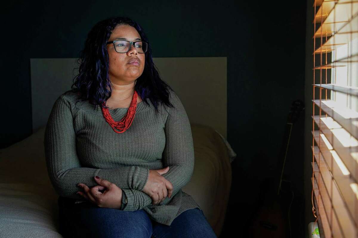 Gaby Velasquez inside the long-stay hotel room she and her three sons are living in on Wednesday, March 16, 2022, in Conroe.