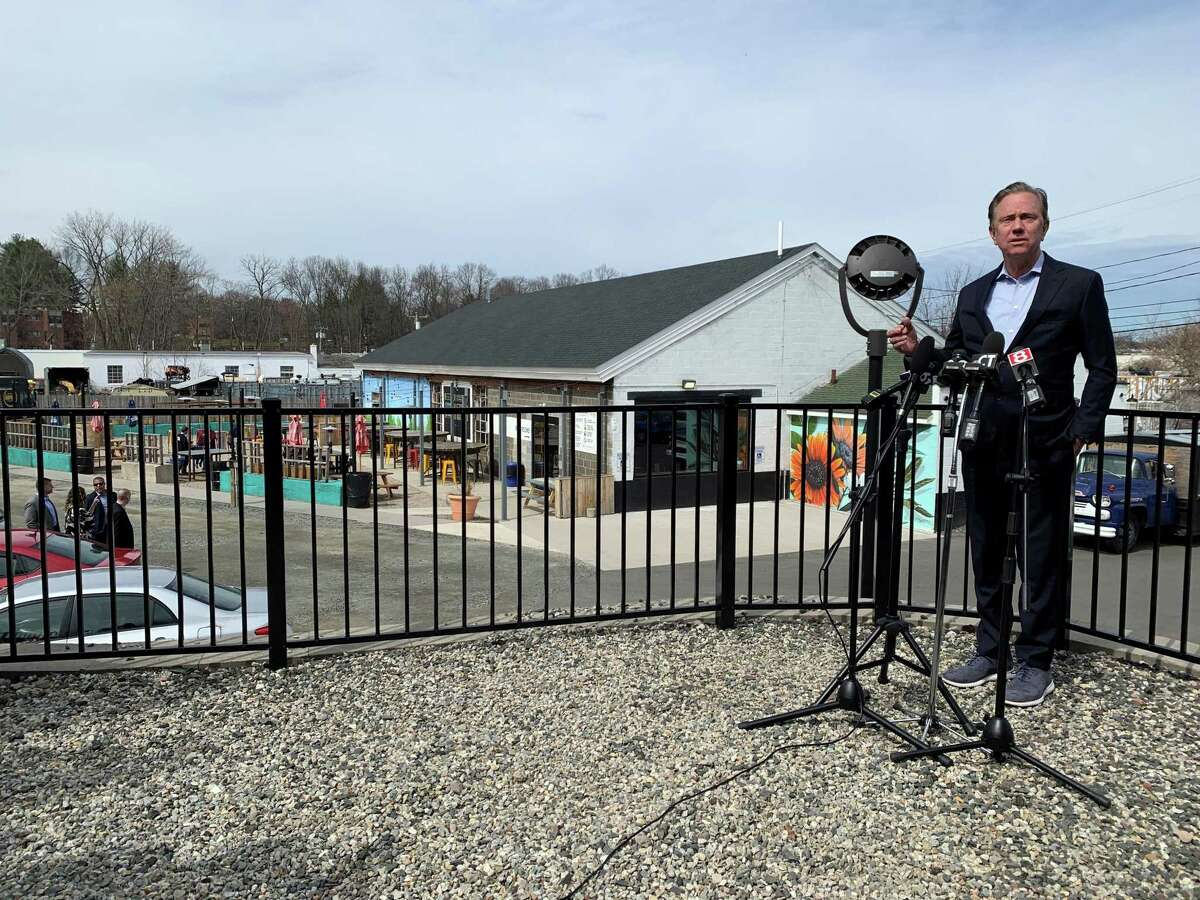 Gov. Ned Lamont speaks about the proposed 25 cent gasoline tax cut at GastroPark in West Hartford.
