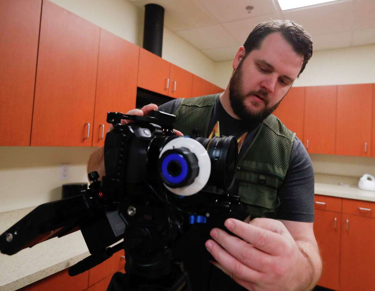 Cinematographer Jake Allen prepares gear before the filming of Breaking Strongholds, a new streaming series in Montgomery County, Saturday, April 10, 2021, in The Woodlands. A premiere of “Breaking Strongholds” will take place April 16 in Montgomery where the series was shot.